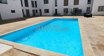 ALPHA TRANSACTION - Dernière Minute : Locations de Vacances à Agadir, Secteur Touristique - Appartement 2 Chambres avec Salon à Agadir Bay - Options à Partir de 1 400 DH